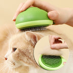 Green pet grooming brush being used on a cat with a beige background