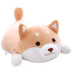 Cute plush toy shaped like a dog on a white background