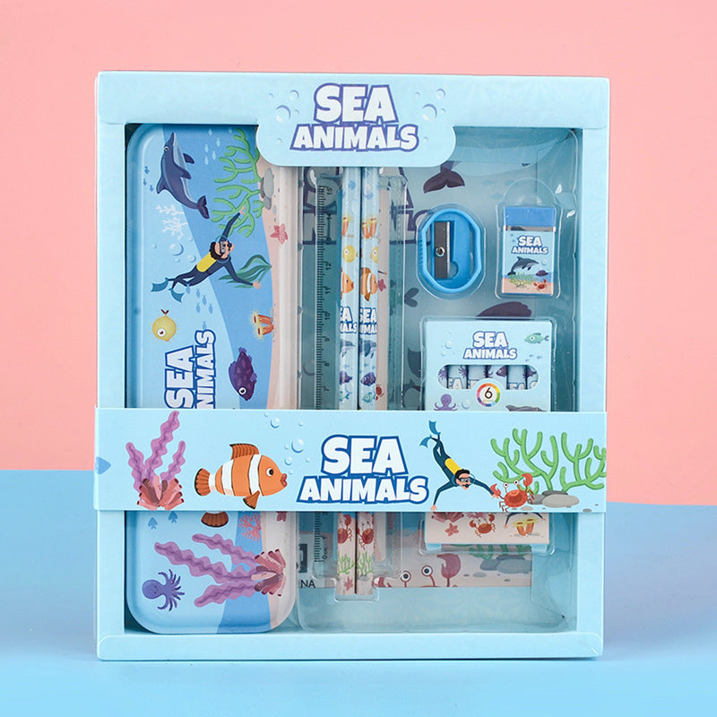 Stationery set with sea animal theme packaging on a pink and blue gradient background