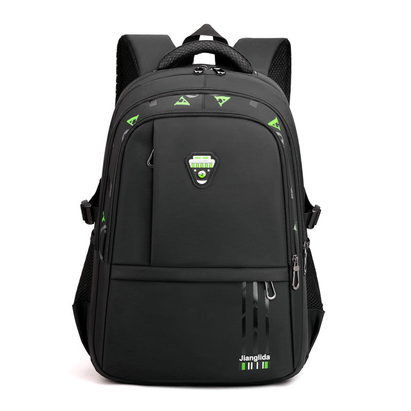 Black backpack with green accents on a white background
