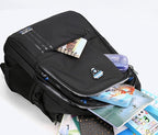 A black backpack filled with school essentials like notebooks set against a white background.