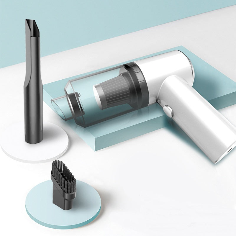 White handheld vacuum cleaner with attachments on a light blue and white background