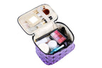 Open makeup case with various cosmetic items on a white background
