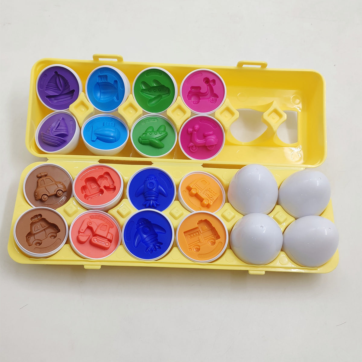 Colorful mold set with various shapes on a white background