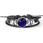 Bracelet with purple central stone on a white background