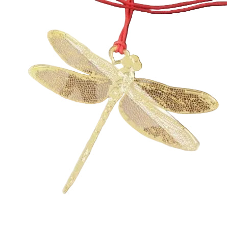 Gold dragonfly-shaped pendant on a red string against a white background