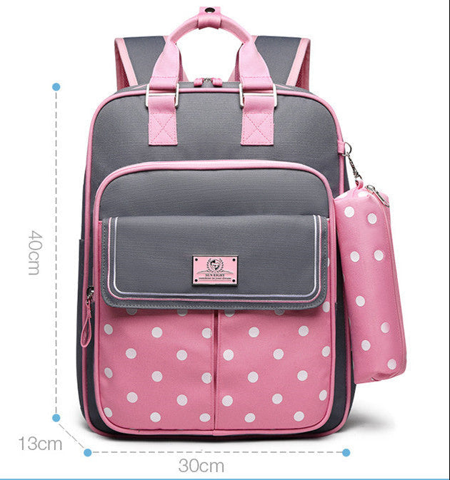 Gray and pink backpack with polka dot design and measurements on a white background