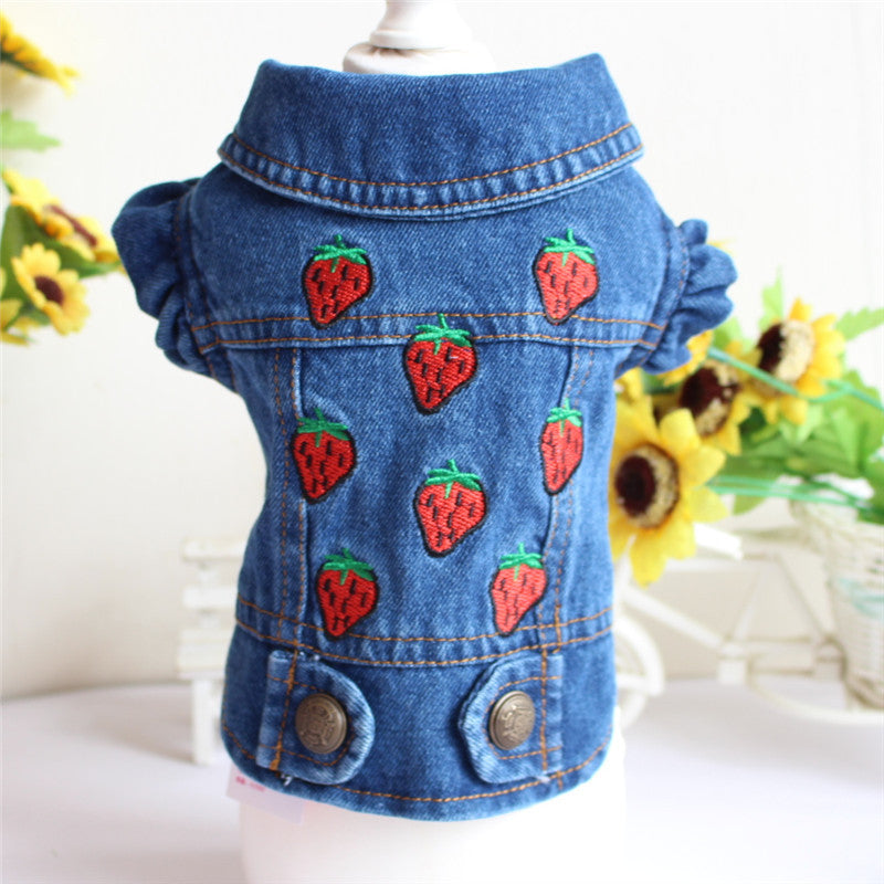 Blue denim jacket with strawberry patterns on a white background