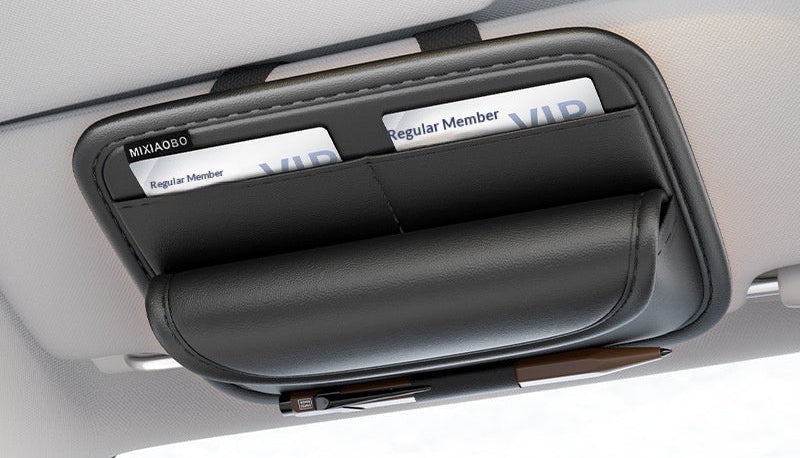 Car visor with an eyeglass case holding cards, branded as Mixiadoso, with promotional text about a second-generation product.