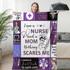 Woman holding up a blanket with Nurse sayings.
