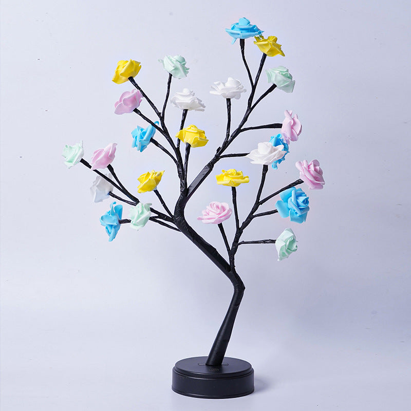 Decorative tree with colorful flowers on a white background