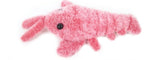 Pink plush toy with measurements on a white background