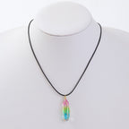 Necklace with a colorful pendant on a mannequin against a white background