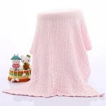 Pink knitted skirt on a white background