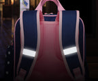 Pink and blue backpack with reflective strips on a blurred indoor background