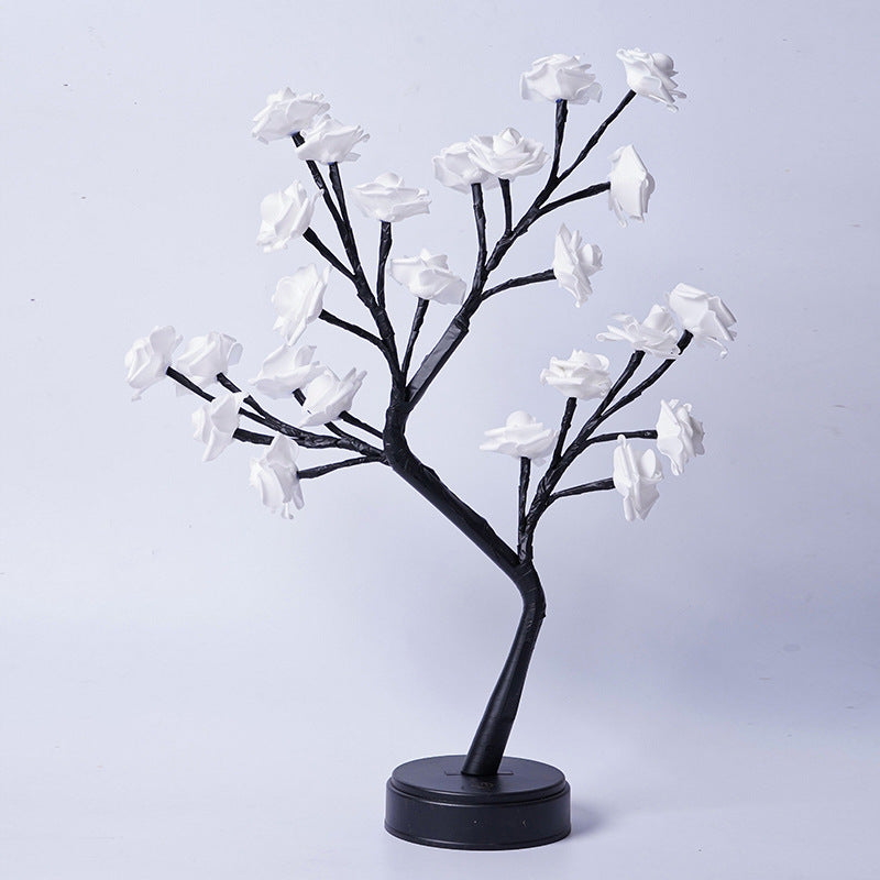 Decorative tree with white flowers on a light gray background