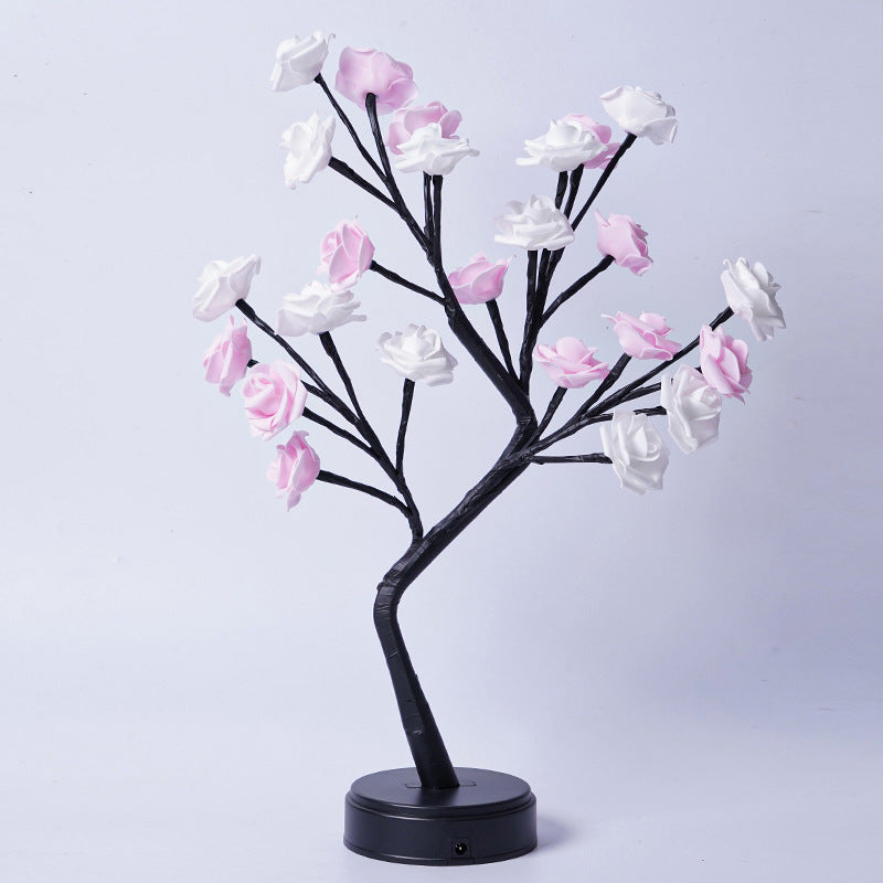 Decorative tree with pink and white flowers on a light gray background