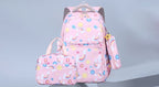 Pink patterned lunch bag set with matching insulated lunch box and pen bag, shown on a light gray background 