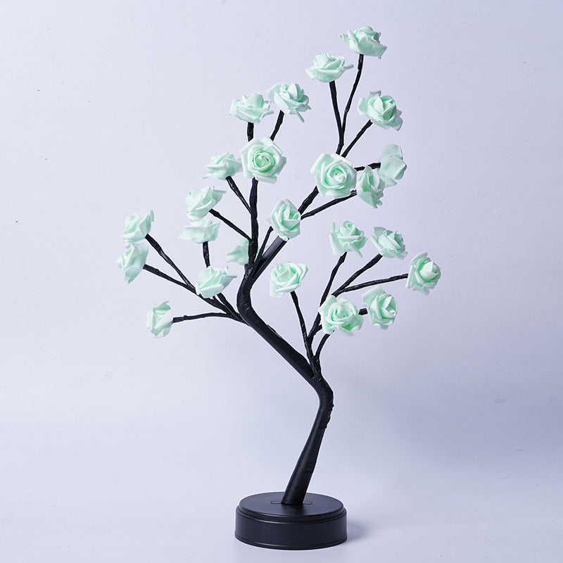 Decorative tree with light blue flowers on a white background