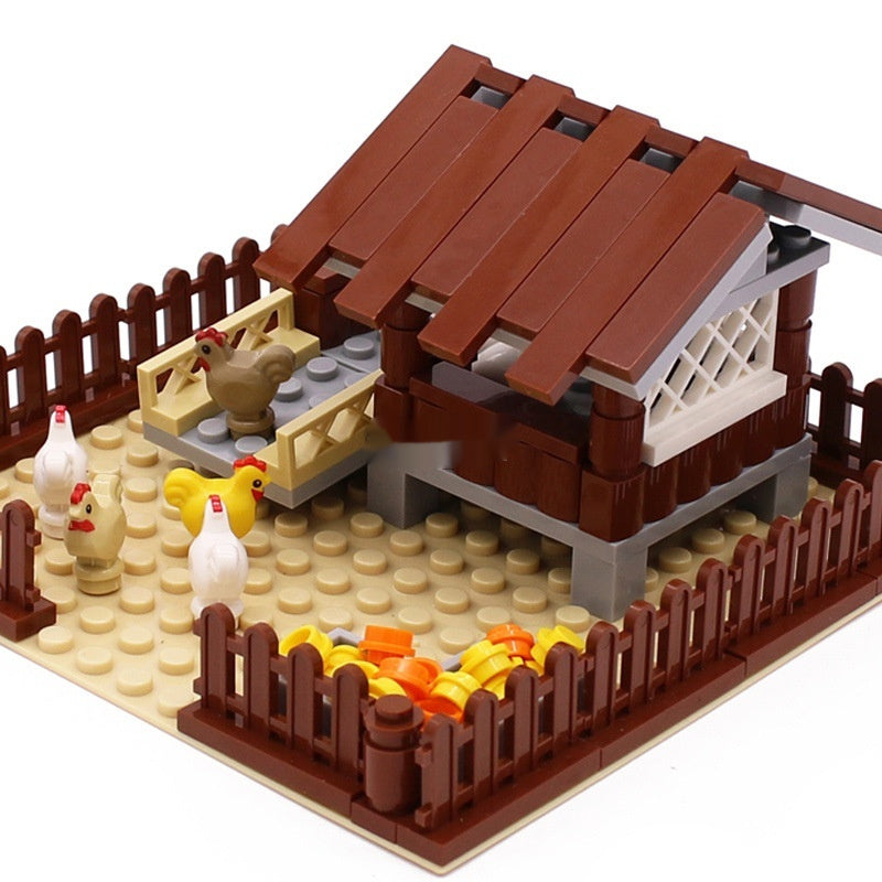 Building set chicken coop with chickens and chicks on a white background