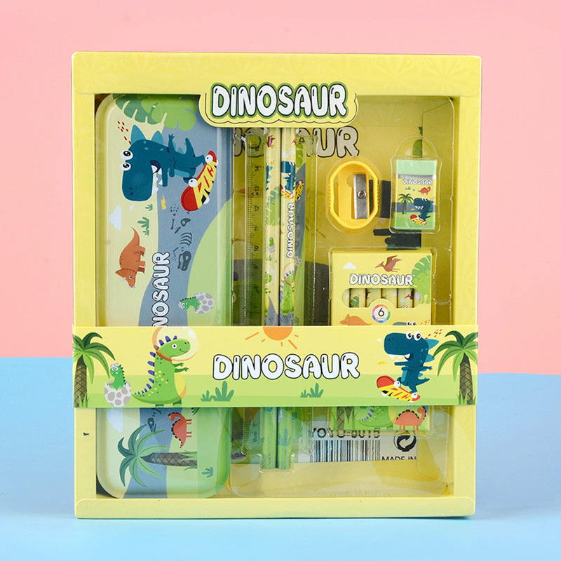 Dinosaur-themed stationery set in a yellow box on a pink and blue gradient background