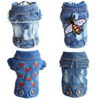 Denim dog coat with bee and strawberry designs on a white background