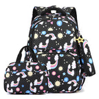 Backpack and matching pouch with unicorn and star pattern on a black background