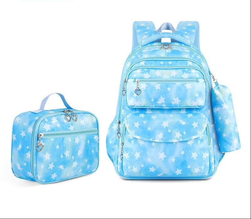 Blue backpack and small bag with star pattern on a white background